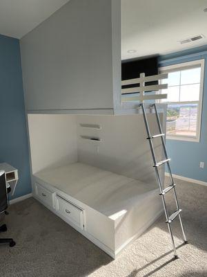 Before: built-in bunk bed, tv mounts, and built-in desk