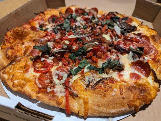 12" Heartland. $17.49. Red sauce, cheese, pepperoni, bacon, balsamic caramelized onions, roasted red peppers, finished with Parmesan, basil.