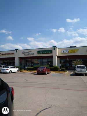 Dentist Office is flanked between Subway and Comet Cleaners