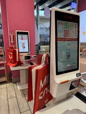 Miniso self checkout kiosk.