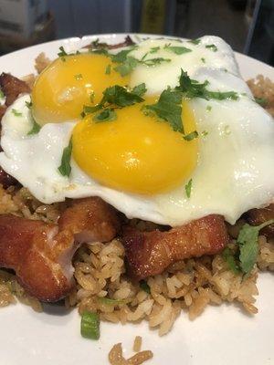 Adobo Pork Belly Fried Rice with Sunny-side up eggs.