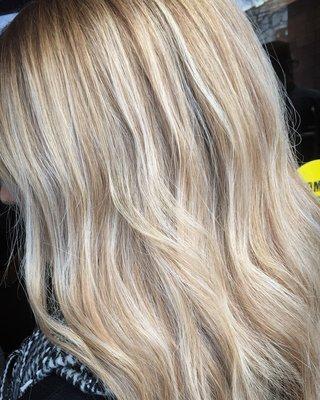 Went from an oil foil technique to this seamless balayage! It gave her dimensions with icy blonde and subtle low lights.