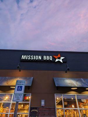 Outside. Storefront sign at Skibo Marketplace.