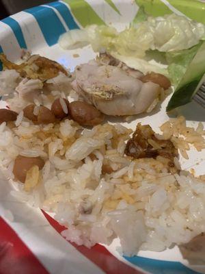 White rice red beans chicken and salad but the white rice has an extra seasoning, hair