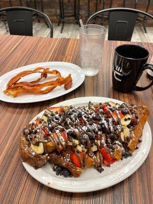 The always amazing french toast , fully loaded with fruit !