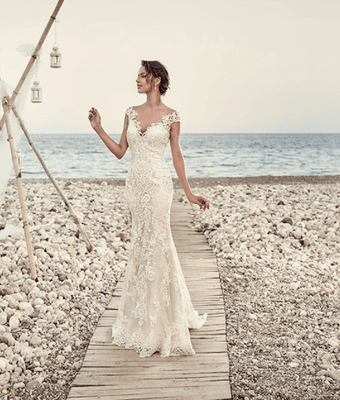 Brittany Burns Bridal - Couture bridal gowns by designer Eddy K