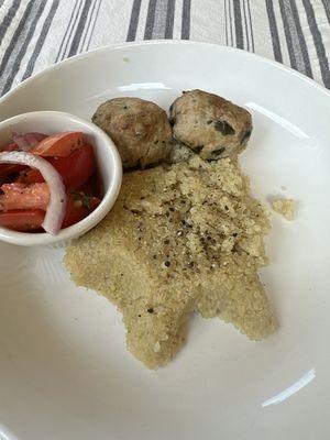 A joke. Turkey meatballs, quinoa, and "pico de gallo". And yes, that's how she served the quinoa.  Made by Guadalupe.