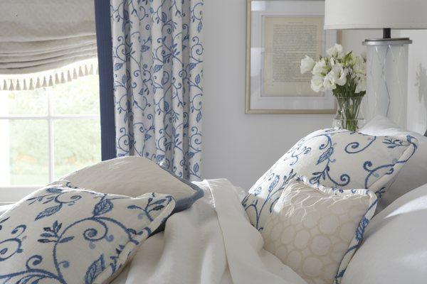 Roman shades, side panel drapes and matching pillows