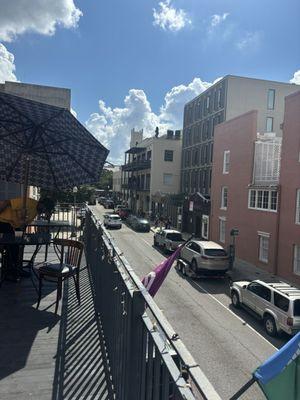 Balcony view! They have outdoor seating with umbrellas.