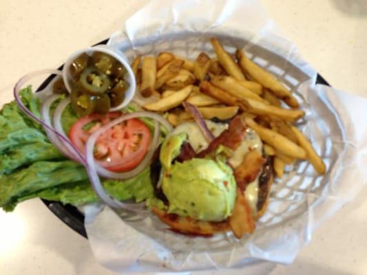 Summit Burger with guacamole, pepper jack cheese, bacon & a side of jalapeños with fries