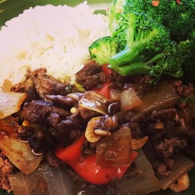 Asian beef tenderloin steamed rice broccoli with red pepper flakes