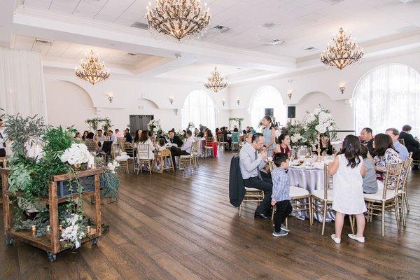 Spacious ballroom with beautiful decor.