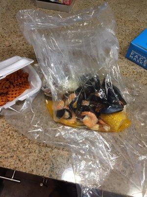 Sweet potato fries, shrimp and mussels butter boil