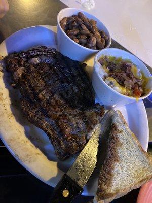 Ribeye with loaded mashed potatoes and brown beans