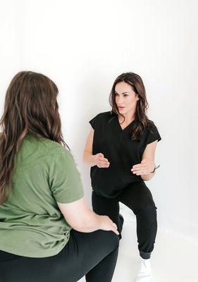 Dr. Rachel working with a patient to address all factors of their symptoms.