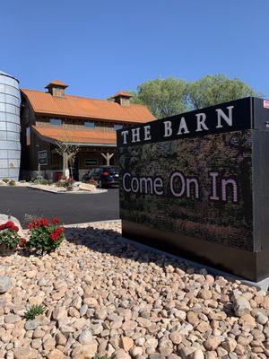 The sign and front of the Barn