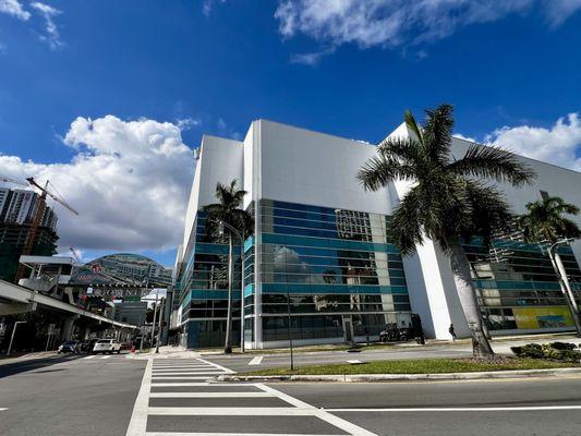 Omni Center building. Passport Photos LLC located on the first floor through entrance in parking garage.