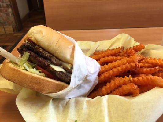 Double meat Texas Burger with bacon and pepper jack cheese.  Served with side of sweet potato fries