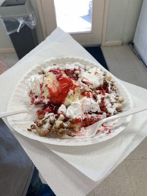 Funnel Cake with Vanilla ice cream, strawberry toppings and whipped cream