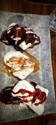 Beignets with chocolate, caramel & strawberry sauces...YUM!