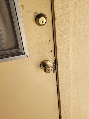 One example of the repairs needed at the office entrance door needs repairs