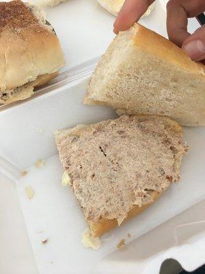 Tuna Sandwich Anyone? If that's what you call it... No lettuce. No Tomato. Just a thin layer of tuna slapped on a stale roll.