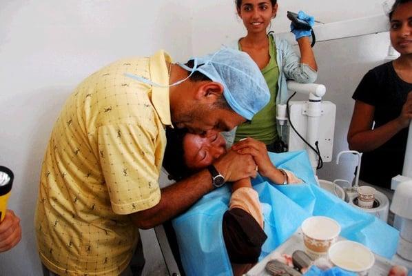 Mending the teeth and the soul of a frightened lady in Himalayas in Aug 2009