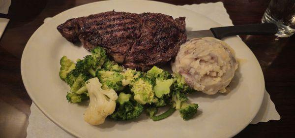 Ribeye, garlic mash and the steamed veggies. Too bad they don't sautee the veggies.