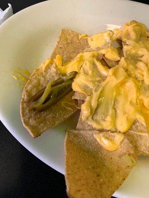 How puts cold cheese on nachos?