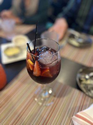 Red Sangria with a rose shaped ice cube