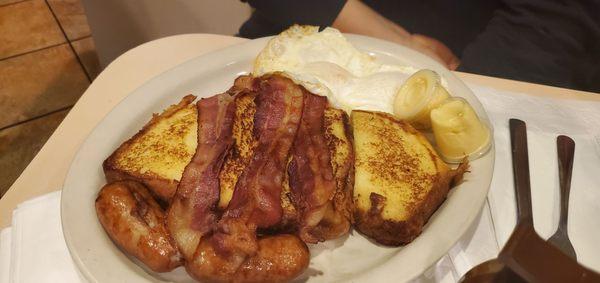 French Toast, bacon, sausage and two eggs