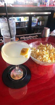 French 75 and complimentary popcorn