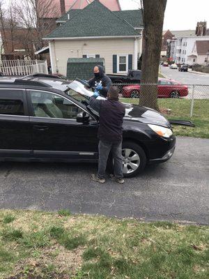 The guys installing my new heated windshield!