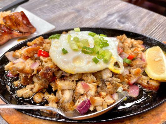 Crispy Pork Sisig with fried egg on top