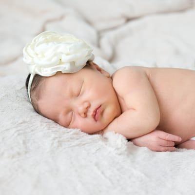 We specialize in portraits that celebrate life from newborn to newlywed.  Newborn portrait sessions in your home 2-3 hours at 7-10 days old.