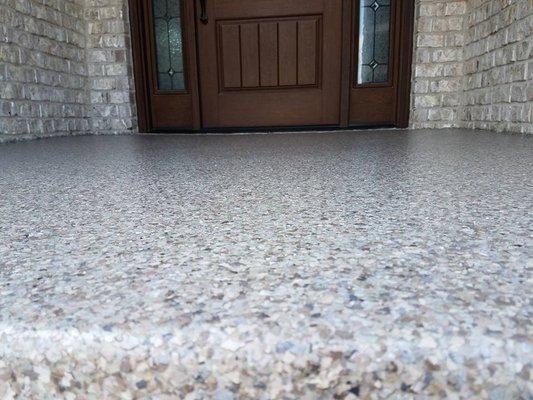 Front entry way with our stone series.  Polyurea will never fade or discolor from the sun.