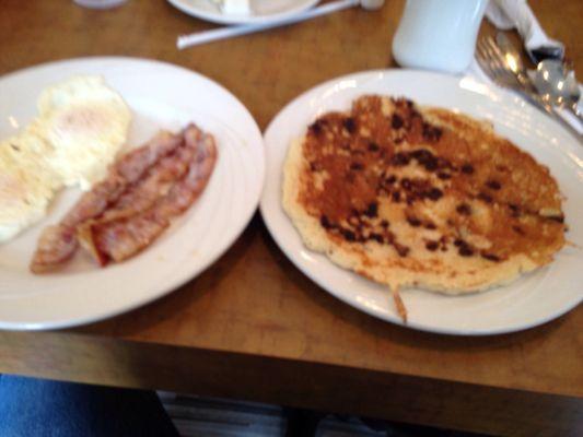 Eggs bacon pancake and coffee. $13