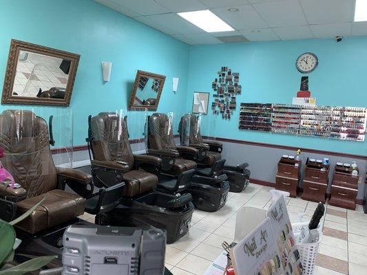 With the pandemic happening, we have pedicure barriers set up for max protection during pedicures, we also have a set up for manicures too!