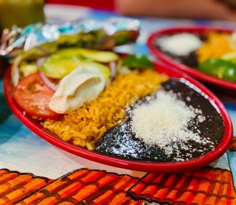 Super fresh Sides w/mojarra frita. Rice Smashed Black beans cojita cheese & real creama with pico salad YUM!!! :)...