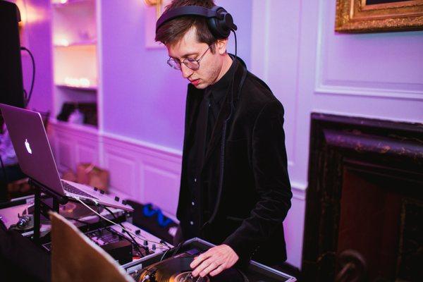 DJ Sam Turner working his magic at my  FiDi (Manhattan NYC) wedding and looking dapper all the while.