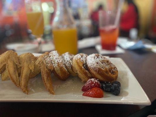 Chicken and Waffles- Mango Mimosas in the background