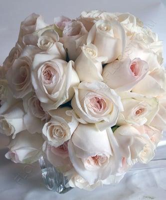 Sweet shade of soft white roses for a bridal bouquet.