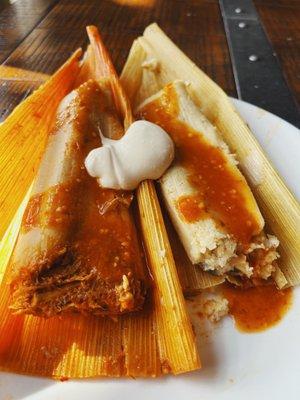 Tamal de puerco & de queso with the spicy salsa roja. I added my own crema at home. Very moist filling, super yummy!