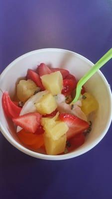 Orange and Tiger's Blood froyos with fruity toppings. Yum!