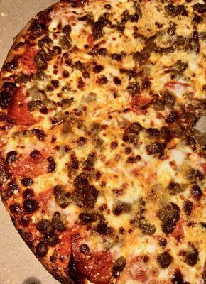 Classic Pepperoni Pizza w/extra pork sausage & extra cheese cooked well done for crispy crust