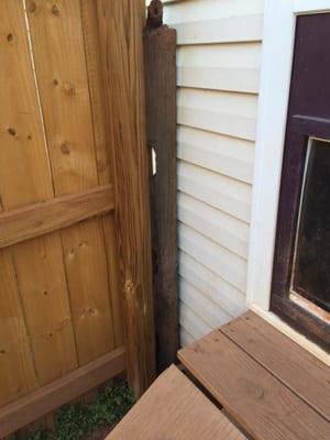 Huge gap between the house and fence where my dog could get out.