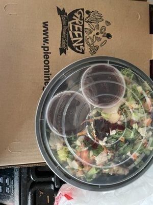 Why are the salad containers inserted into where my salad should be