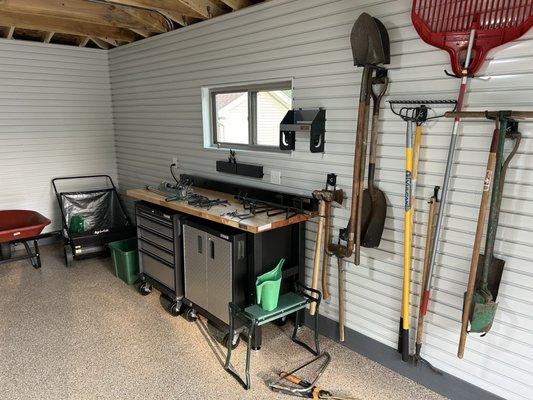 Picture of finished flooring as well as one of the gear walls.