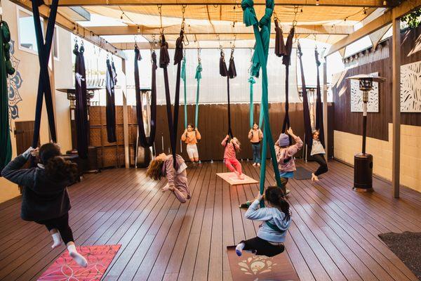 Kids ages 4 and up can enjoy an aerial class while parents can hop into yoga or a spa treatment!