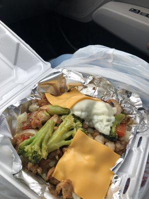 Stuffed potatoes with chicken/shrimp/broccoli/onions/peppers/ mushrooms/and of course cheese!